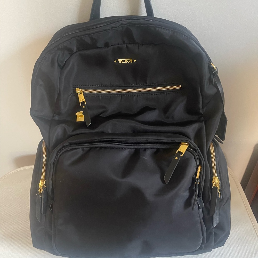TUMI Jet Black Backpack with Gold Details